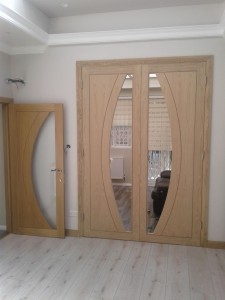 Veneered fire check doors